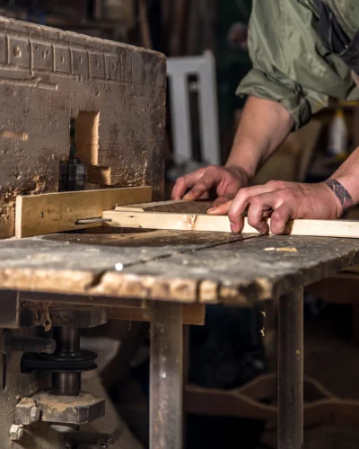 man_working_with_wood_product_machine_scaled